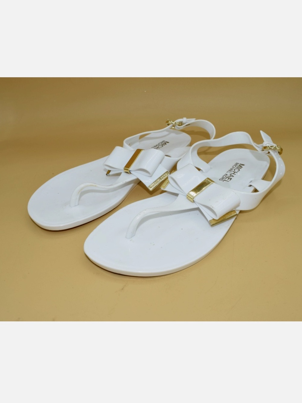 Michael Kors White Gold-Accent Bow Jelly Thong Sandals